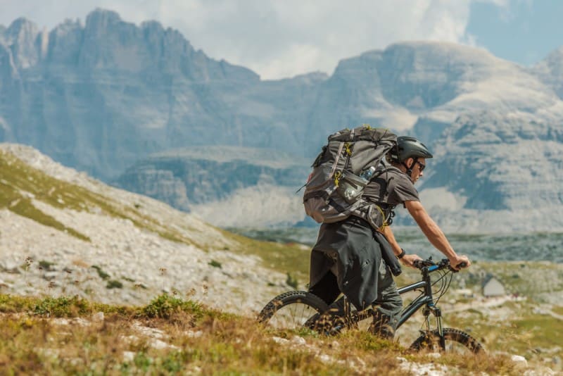 Man Riding His Bike In The Mountain