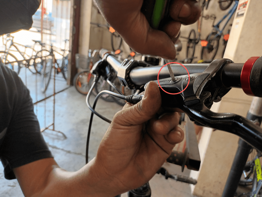 Close the valve and remove the bleeding hose. Move the brake lever until it’s already back by around 30 degrees.