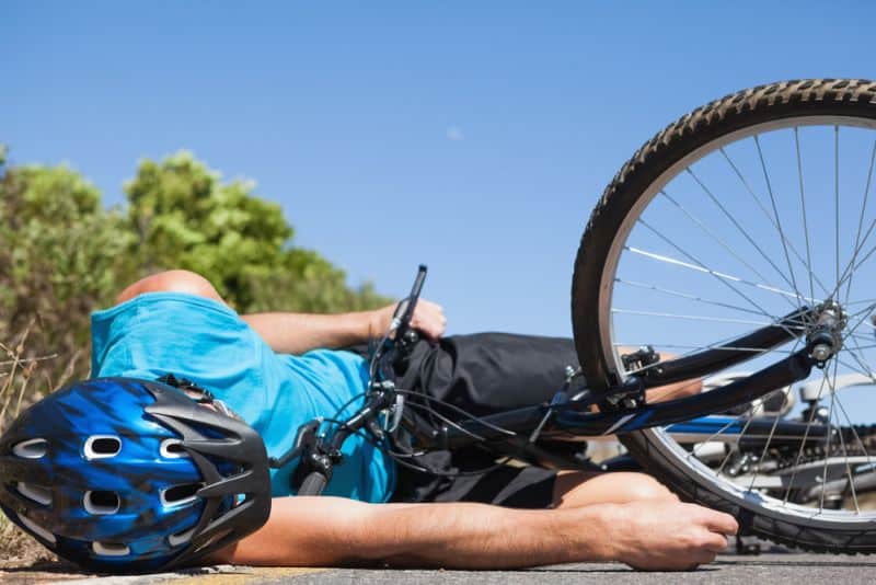 riding mountain bike on pavement