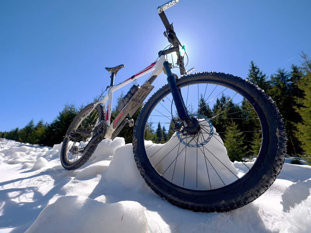 large mountain bike on snowy mountain