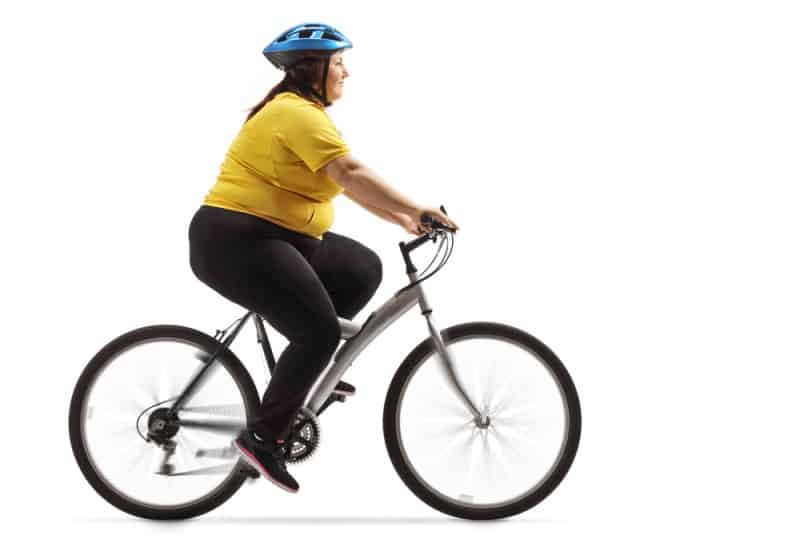 overweight woman riding a bike